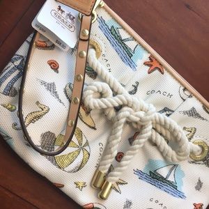 🐙RARE COACH “BEACH PRINT” WRISTLET🐡